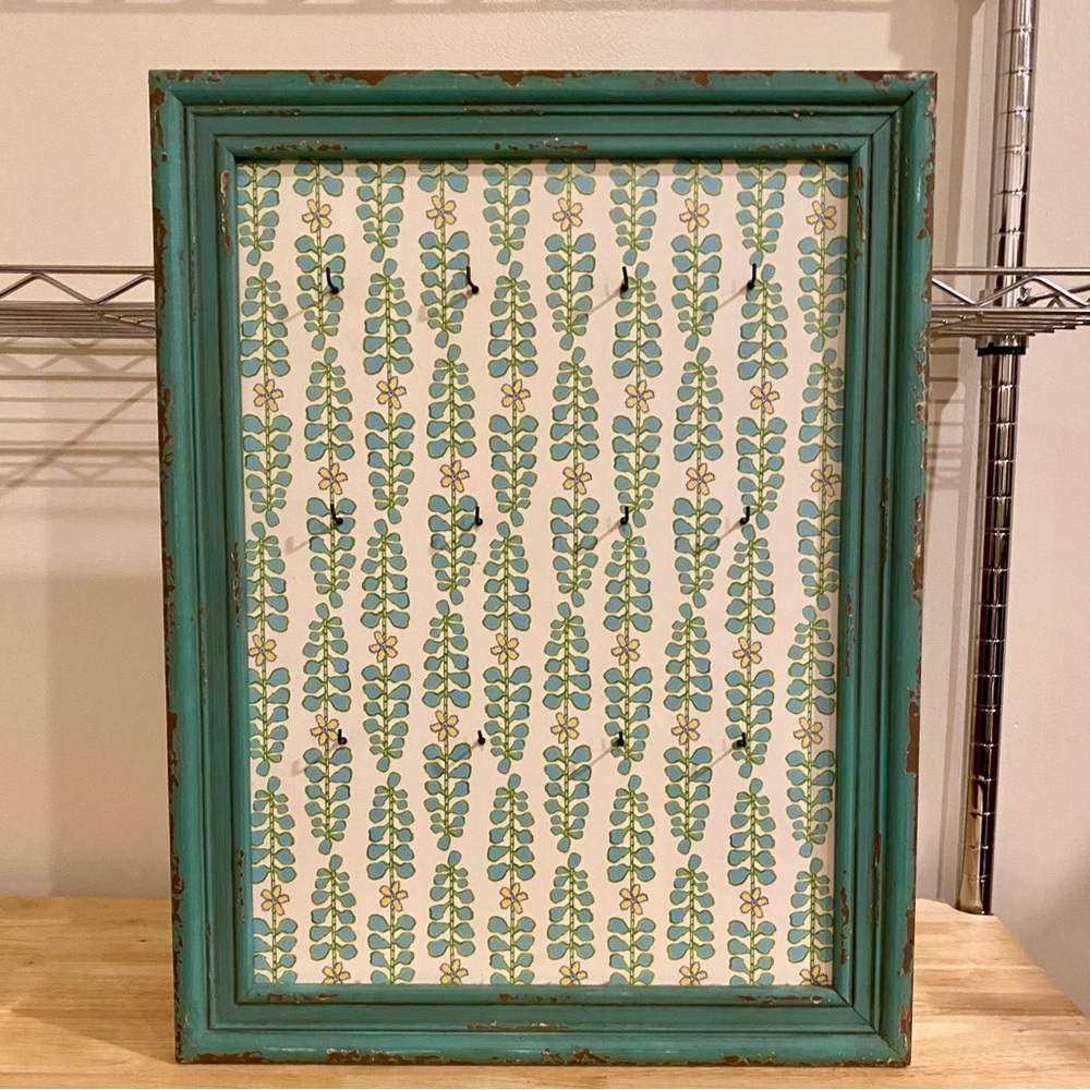 Francesca’s Teal Wood Frame with Floral Leaf Pattern and jewelry hooks.